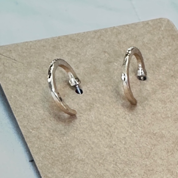 2/$15 Gold tone hoop earrings with clear round crystals on top half. Post back. - Picture 6 of 9